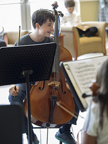 cellist smiling