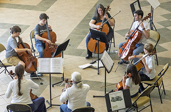 people playing cello