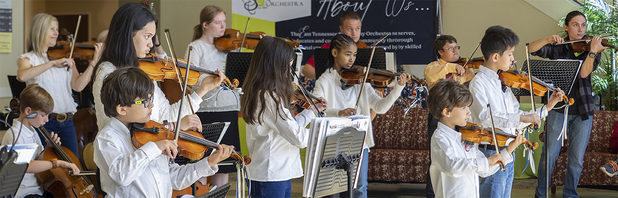 children playing violins