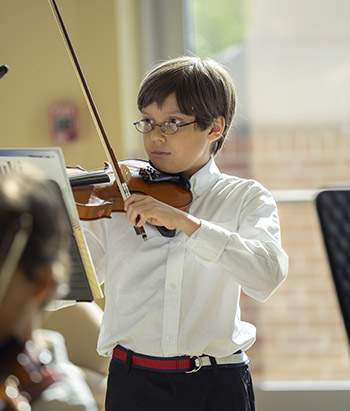 boy playing violin