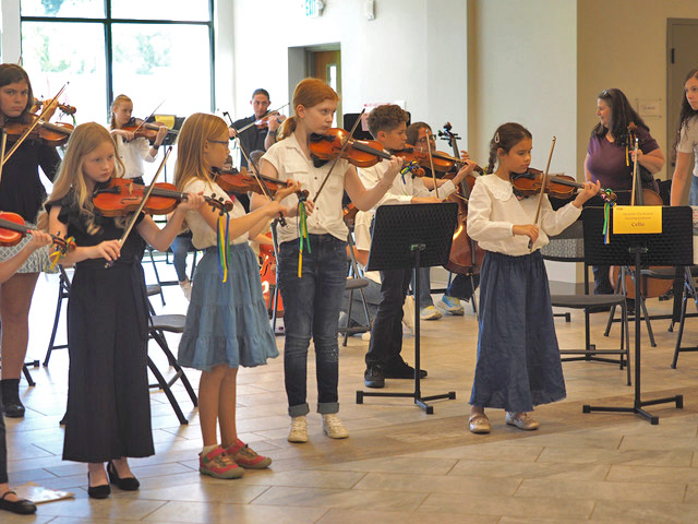 children playing violin