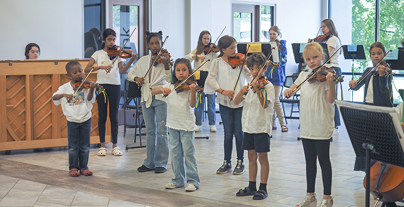 children playing violins