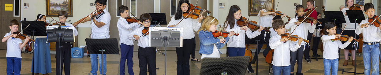 children playing violins